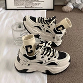 Monochrome Motion Sneakers black Shoptery