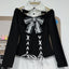 Jirai Kei Off-Shoulder Lace-Up Knit Top & Plaid Ruffle Skirt Set Only Top Shoptery