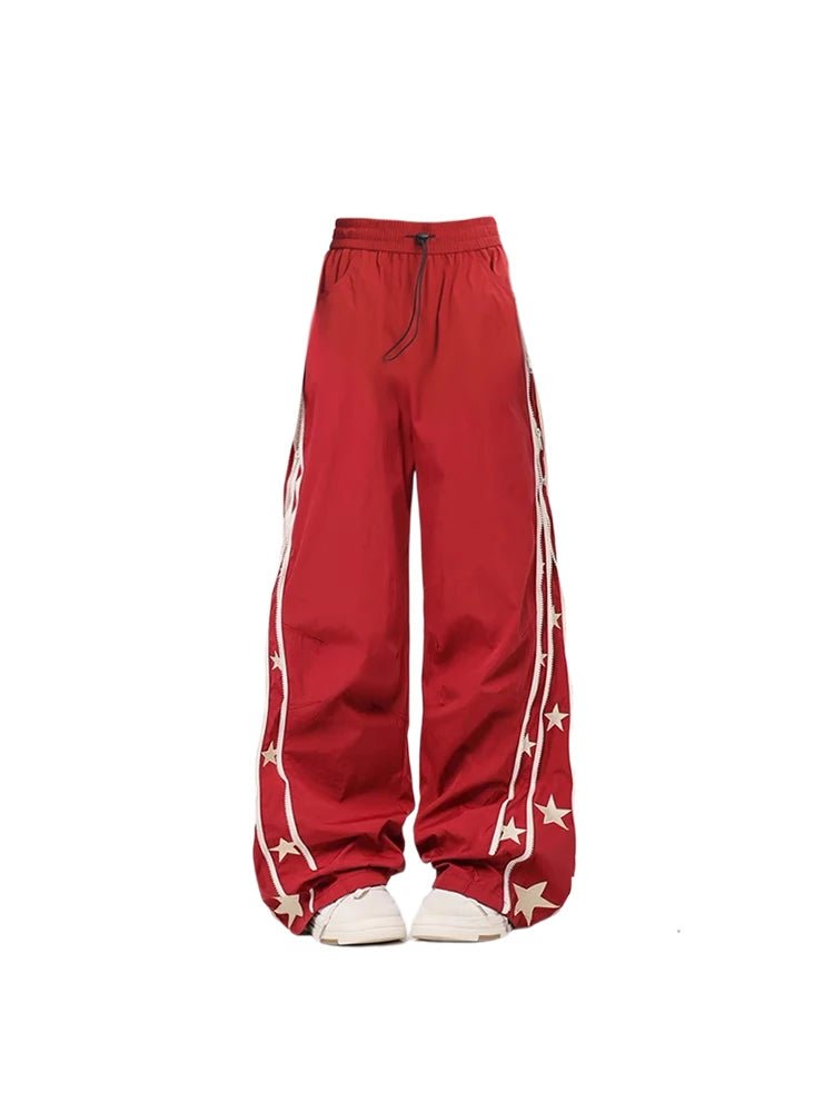 Red track pants with white stripe on sale