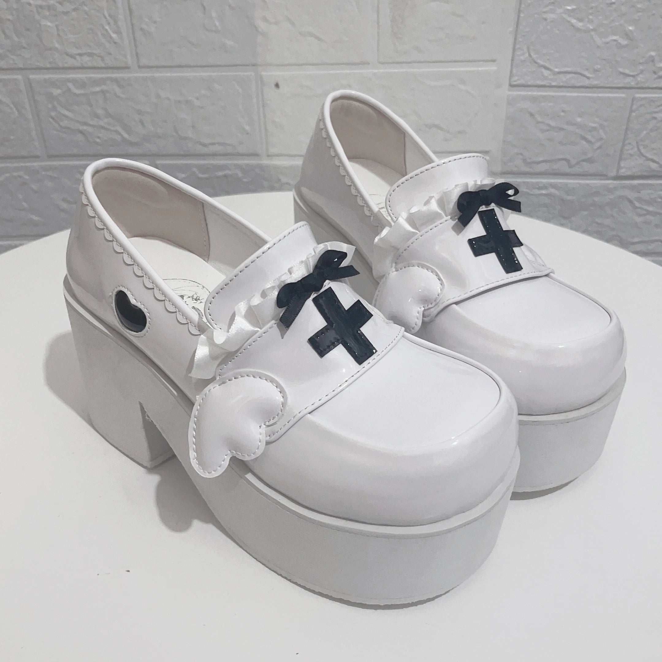 Menhera White Platform Loafers with Cross and Bow Details Secondary image