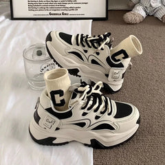 Monochrome Motion Sneakers black Shoptery