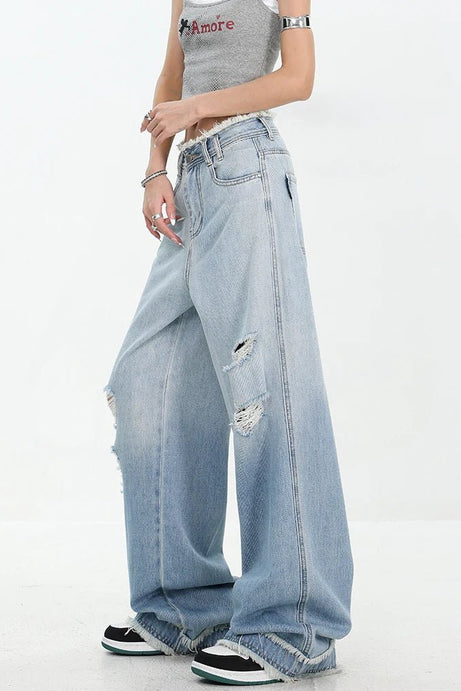 Ripped Edge Wide - Leg Jeans - 