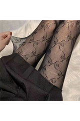 Coquette Bow Fishnet Tights black One Size Shoptery
